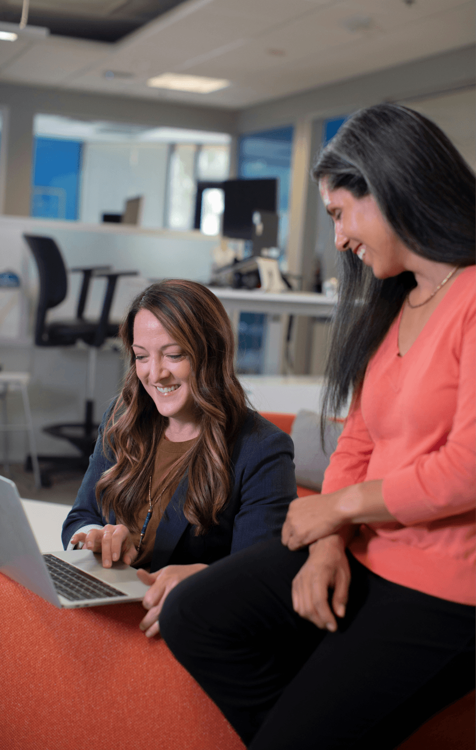 Women looking at computer screen